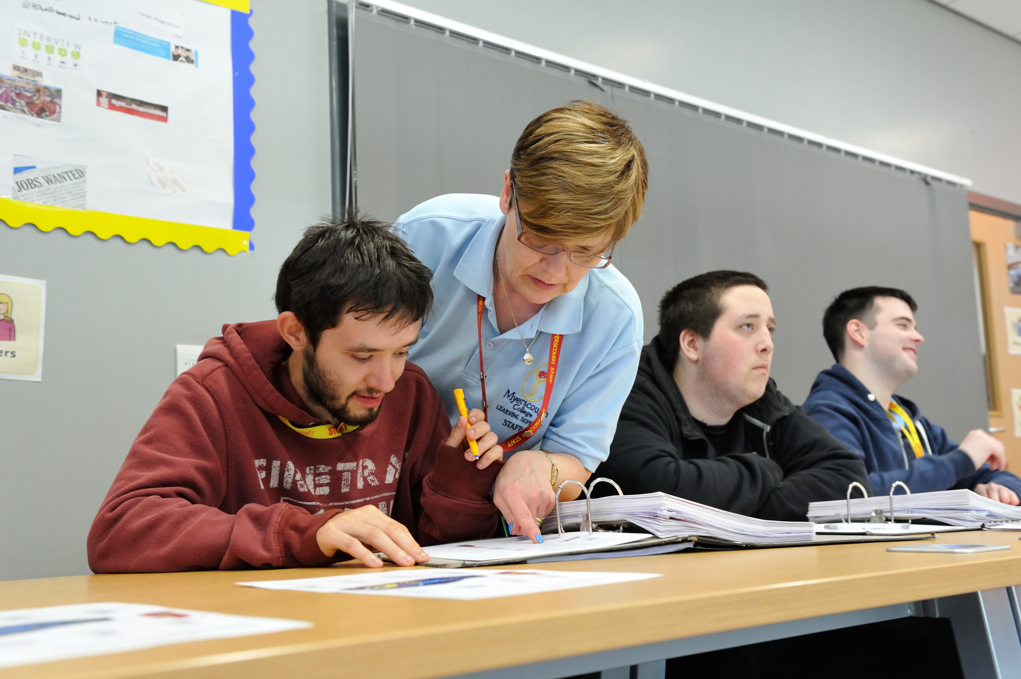 An Myerscough College learning support advisor offering one-to-one support to a student