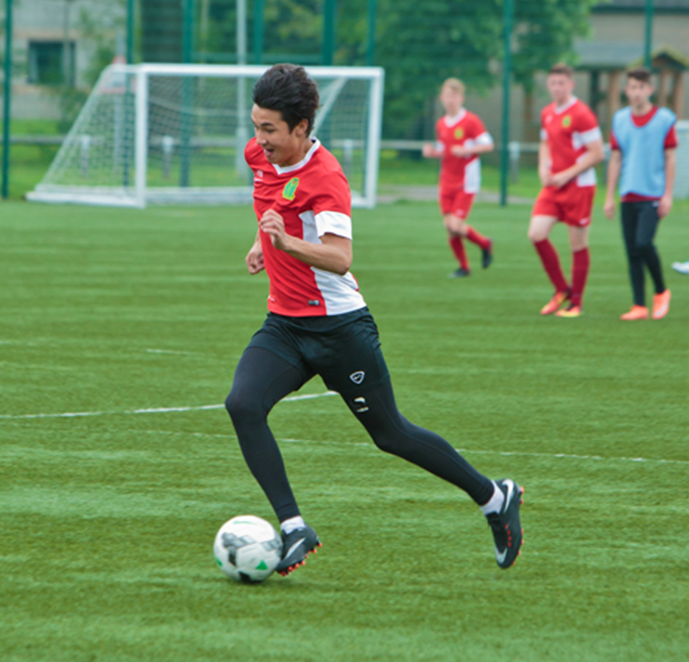 Myerscough College student plays football on a 3G pitch