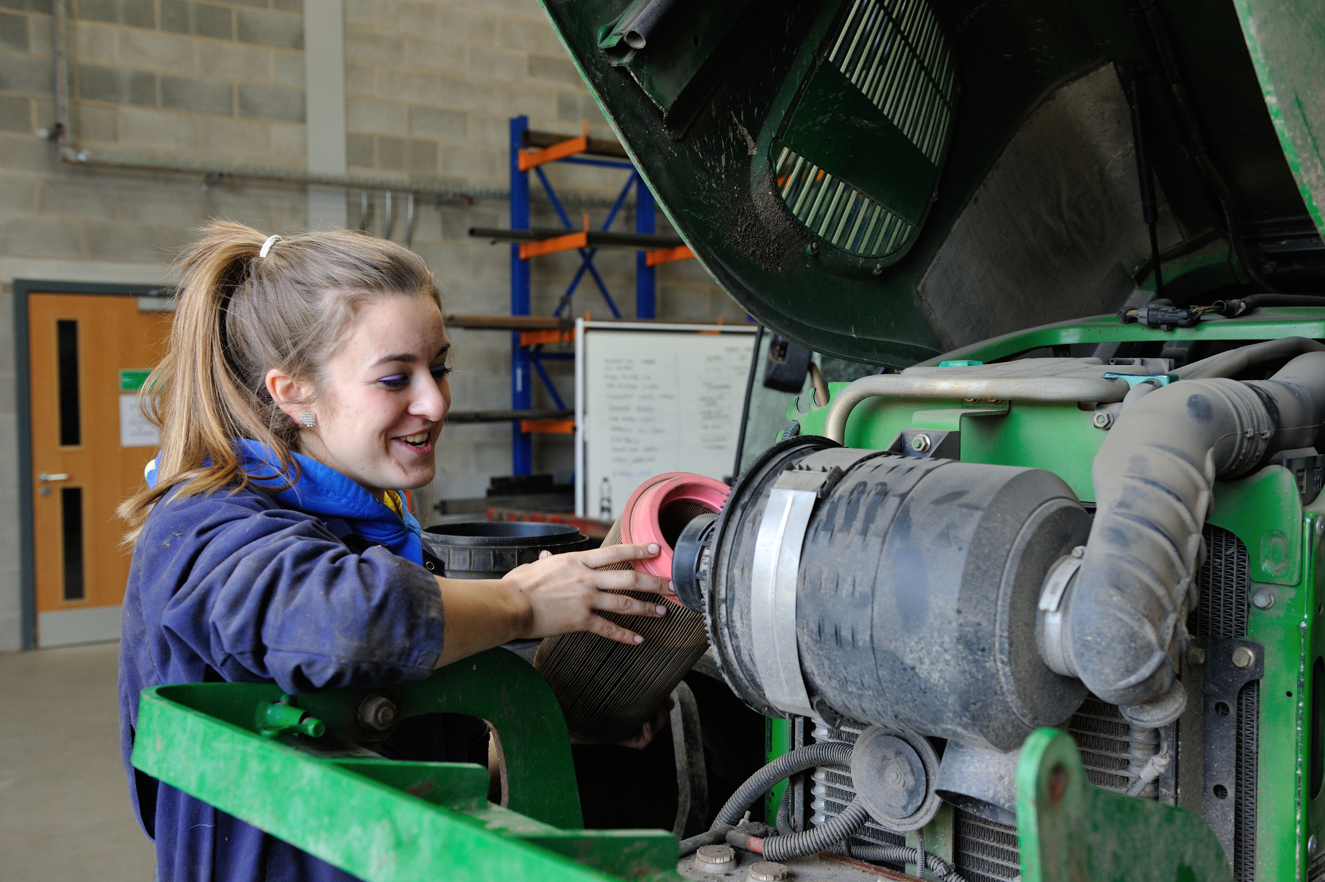 Myerscough College Agriculture student inspects a tractor