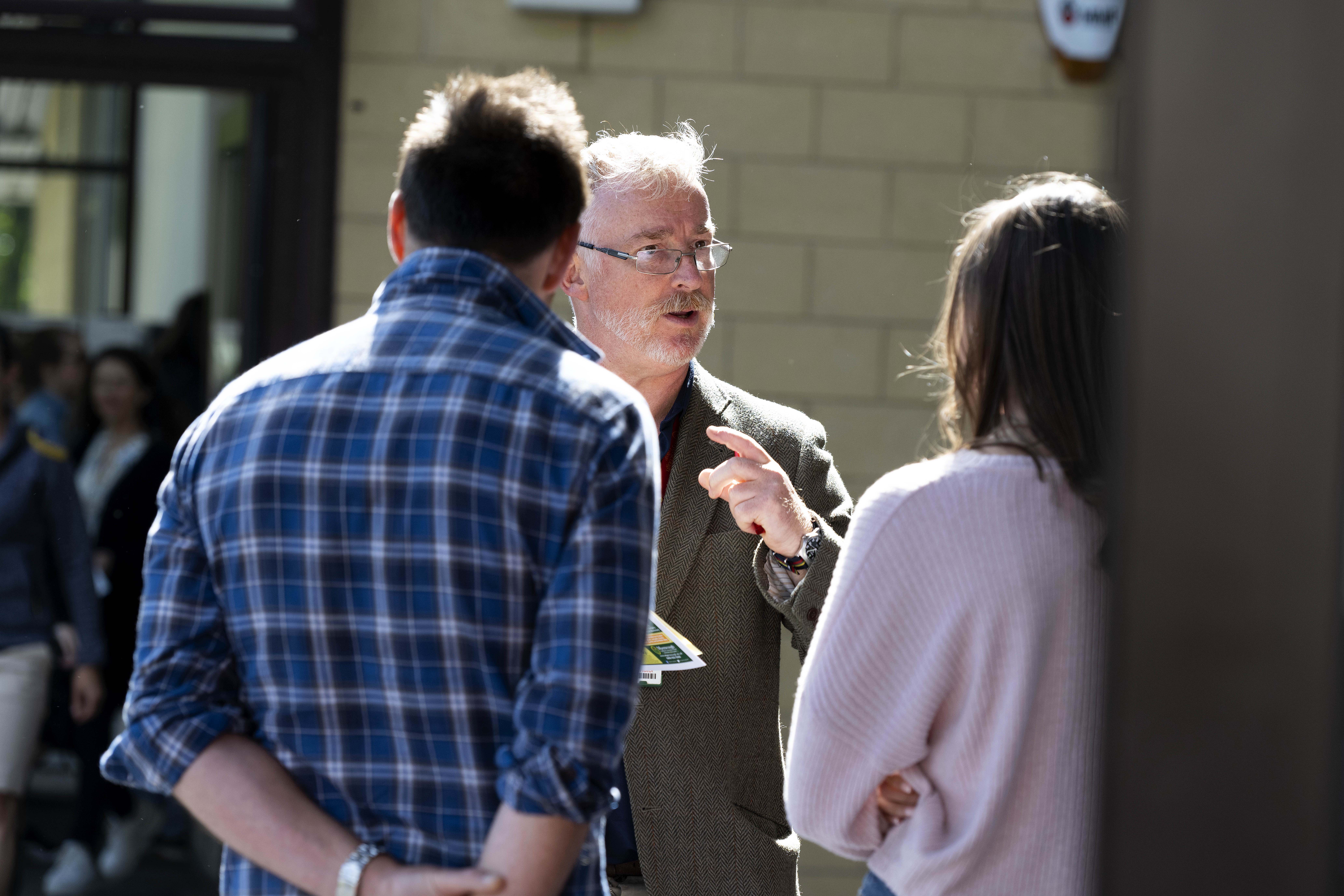 Schools Liaison Co-ordinator Nick Harrison talking to prospective students